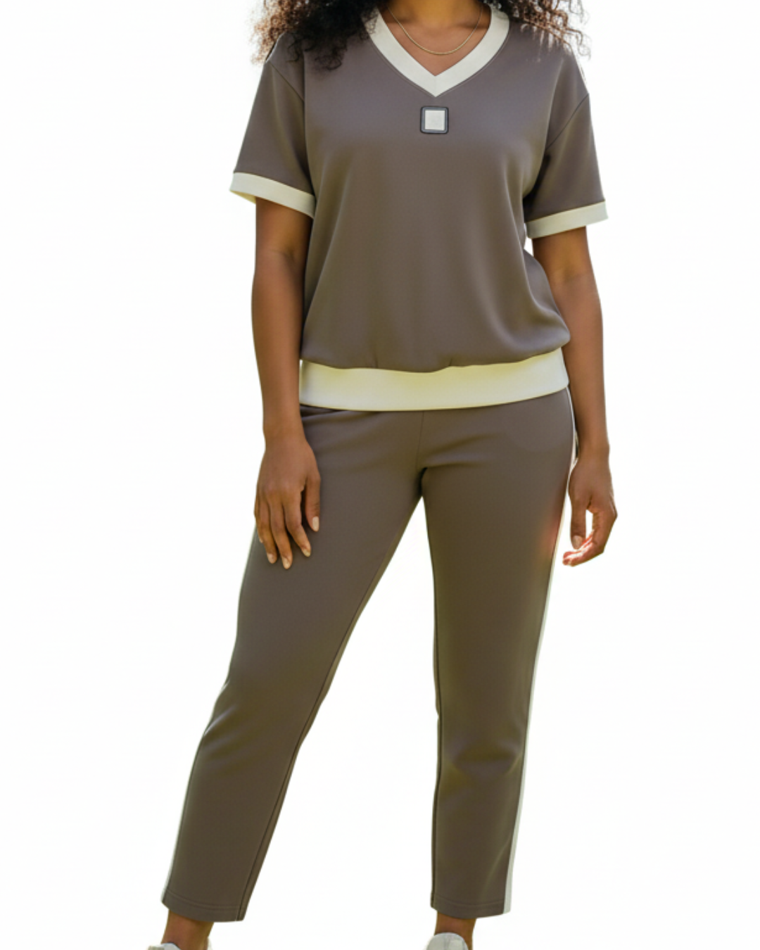 Conjunto elegante de top e calças com decote em V®