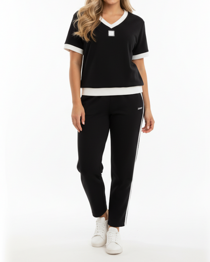Conjunto elegante de top e calças com decote em V®