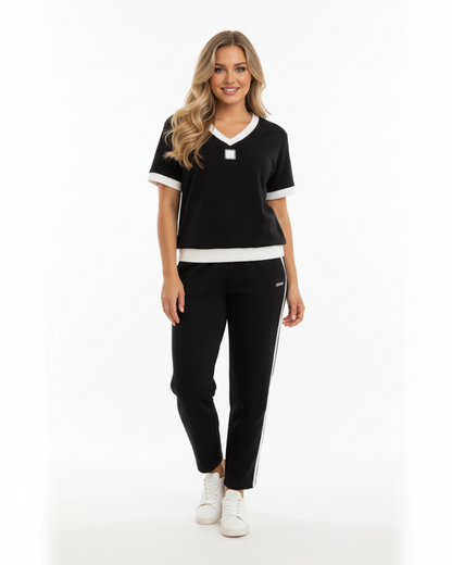 Conjunto elegante de top e calças com decote em V®